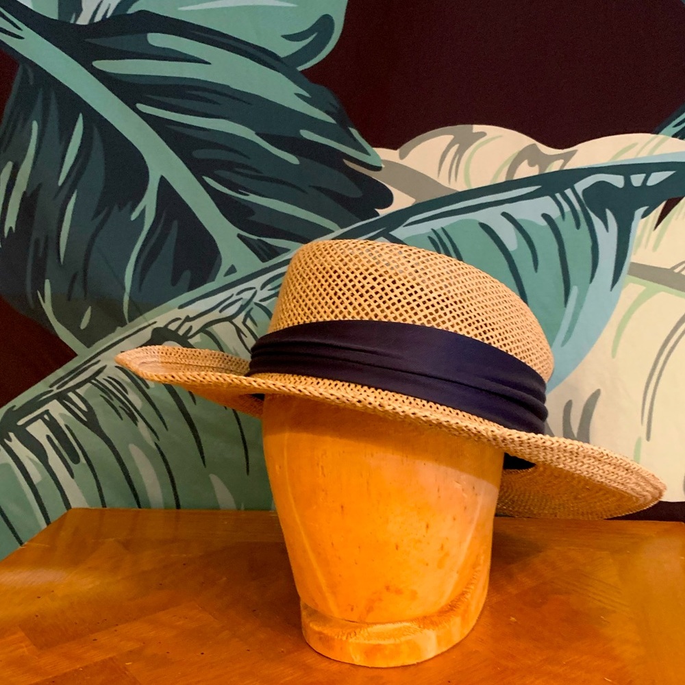 Wire rimmed starched straw hat